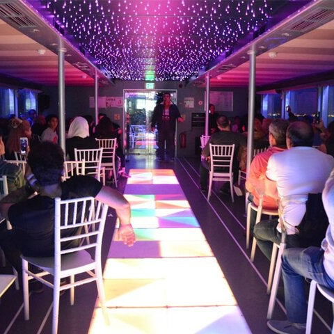 Experience a luxurious catamaran dinner cruise in Dubai Marina with live entertainment, delicious Arabian cuisine, and private hotel transfers.